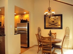 Dining area.  There is a leaf to expand the table to hold 6 diners.