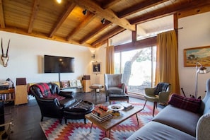 The living room with beautiful vaulted ceiling.