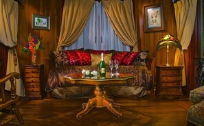 Picture perfect, sitting room by day, bedroom by night