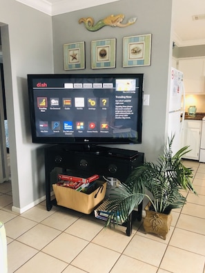 Living area has 55" flatscreen TV w/DISH Network.