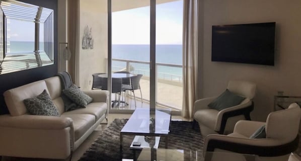 Living Room with magnificent view. Cozy yet modern feel!