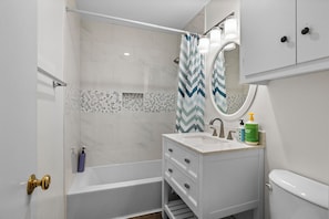 Just adjacent to the bedrooms is the upstairs bathroom