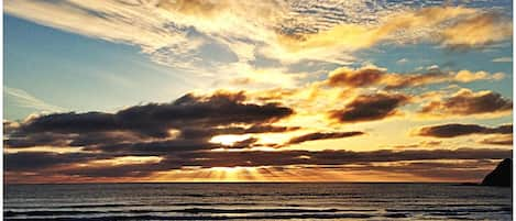 Sunset from the beach in front of our beach house