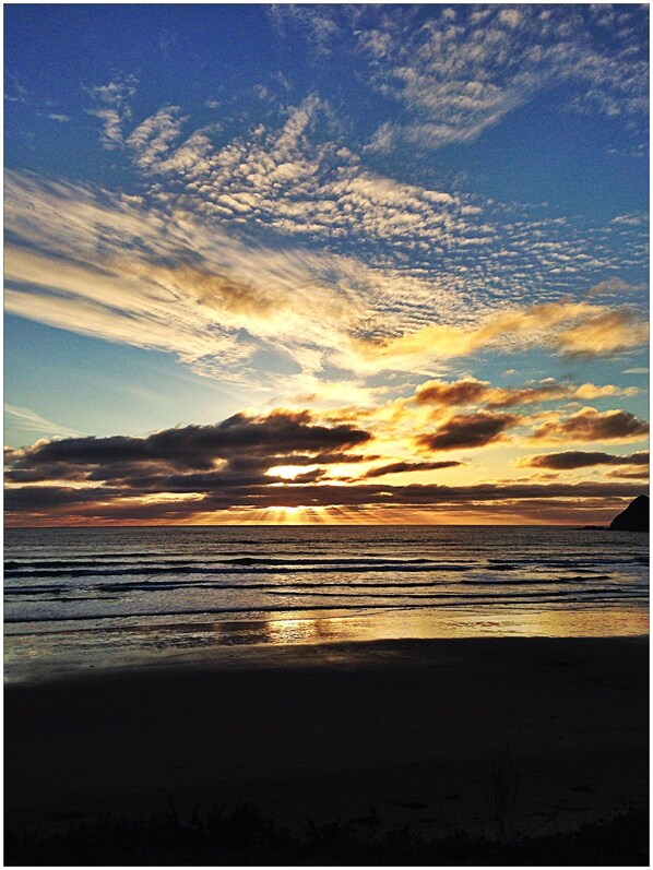 Sunset from the beach in front of our beach house