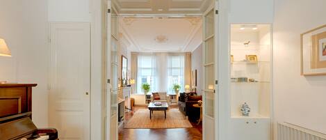 En suite living area, as seen from dining space.