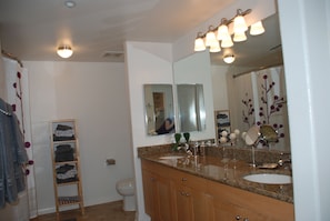 Master bath vanity with two sinks.