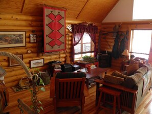 Living room (HD TV is located behind the hanging rug)...