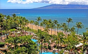 Sand beach.  Three outdoor swimming pools.  Two outdoor whirlpool spas.