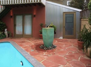 The peaceful sound of a bubbling fountain right outside your doorway.