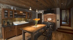 Farmhouse stye kitchen is ideal for gathering and for preparing meals...