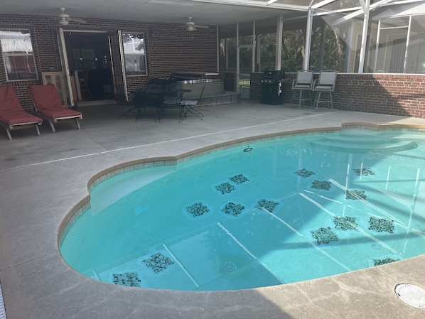 Pool, patio table w/ 6 chairs, hot tub, lounge chairs, BBQ