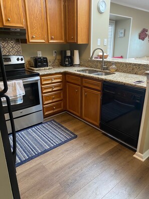 Kitchen- coffee maker, toaster, microwave, dishwasher and toaster oven provided.