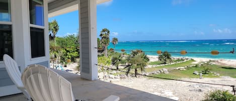 The stunning view outside the master bedroom and all the colors of Cutlass Bay!