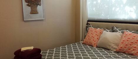 Bedroom with new Simmons Beauty Rest queen mattress.