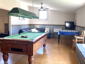 Games room with pool table and foosball