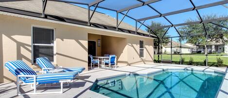 Sunny pool deck with private pool