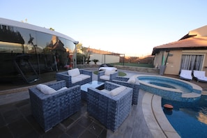 Sit next to the pool with our comfortable sofas 