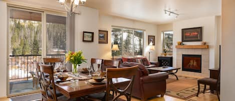 View of dining and living room with the fireplace