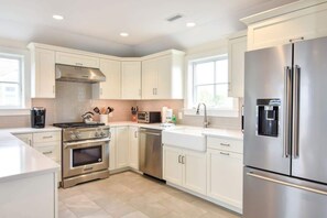 kitchen with white cabinets and stainless steel appliances