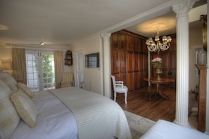 large king room with covered patio leading to herb garden. Honeymoon suite!