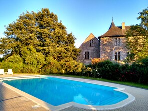 The sweetness of the Angevin - the golden sunlight, pool and a holiday castle!
