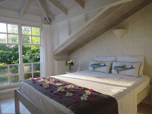 Loft bedroom with ocean view