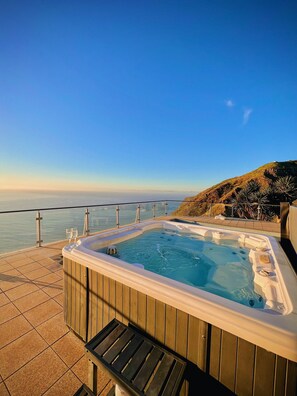 Enjoy the jacuzzi at sunset.