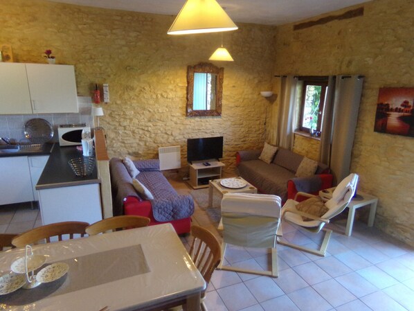 Ground floor given over to an open plan living dining and kitchen area