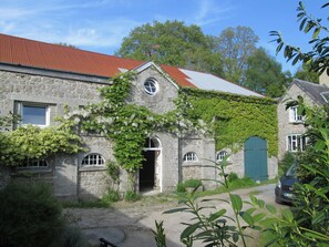 Front view of Coach house and car parking space