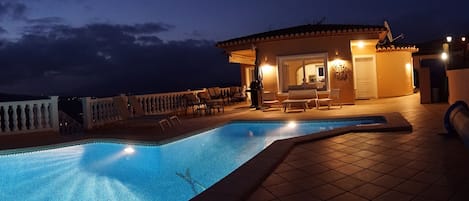 Enjoy quiet, ambient, cool nights sitting around the pool.