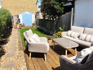 Private garden with decked area perfect for alfresco dining