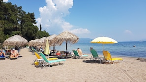 Sandy beach is just 2 minutes walk from the villa