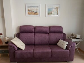 Sofà salón comedor apartamento