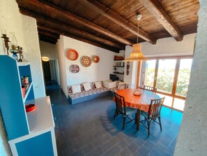 Living room with the corridor leading to the rooms