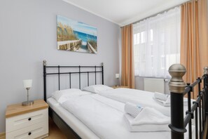 A quiet bedroom perfect for relaxing.