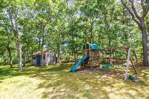 children's play structure in backyard