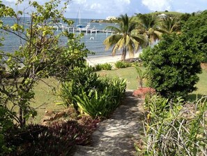 Going to our beach down a few wide steps from the back of the front deck/ porch.