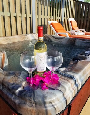 Hot tub is perfect for sipping wine and watching those sunsets.