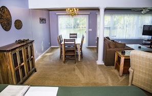 Large dining room table with seating for six