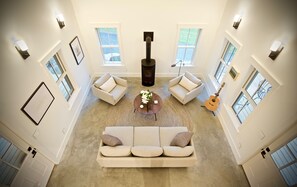 The view of the Living Room from the Great Room upstairs