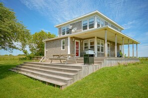 View of the large Farmhouse with spacious deck
