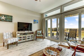 Living room with large flat screen tv