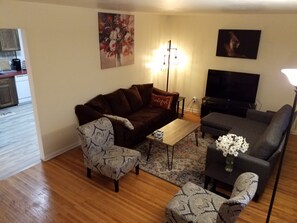 Living Room with  sofas, chaise, and accent chairs