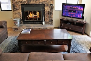 Wood Burning Fireplace and Flat Screen TV
