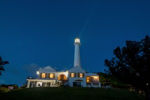 AMOUR AMOUR at Night in the Shadows of Gibb's Hill Lighthouse