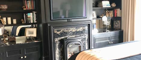 gas fireplace built in TV with surround sound 
