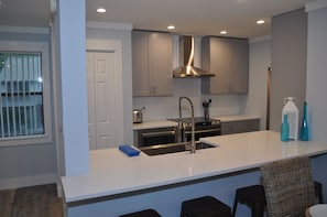 Fully renovated kitchen with new cabinets, countertops and appliances!
