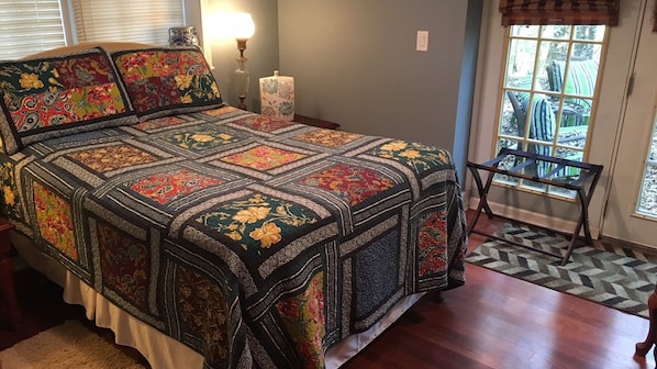 Room #3: Sleeps 2
Shared bath
One queen bed
French doors open to outside