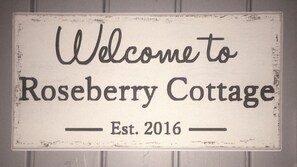 The cottage is named. This sign was given to us from very special people. 