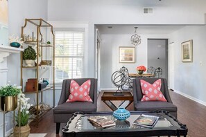 An alternative view of the family room with a peek into the dining area.